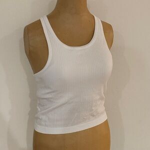 Lululemon sz 6 Ebb To Street Tank II
White Ribbed Tank Top bra like new cond